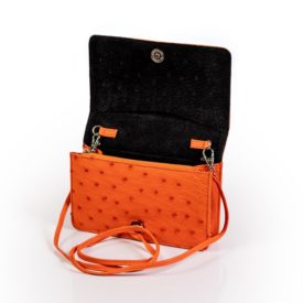 Orange ostrich leather handbag open